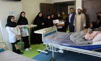 عیادت مسئولین دانشگاهی از نوزادان متولدشده در عید غدیر خم در مرکز آموزشی و درمانی جامع زنان کوثر